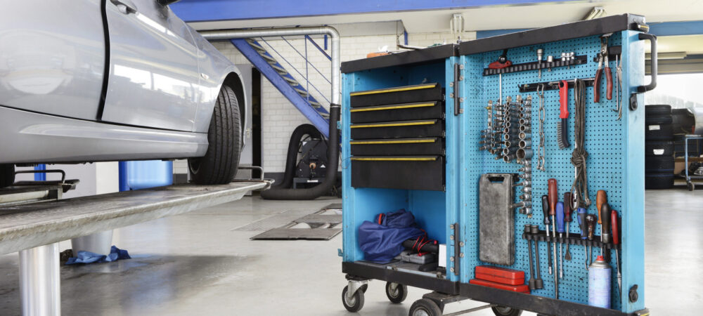 Auto repair shop,Garage with tool cart. Garage with tool cart.